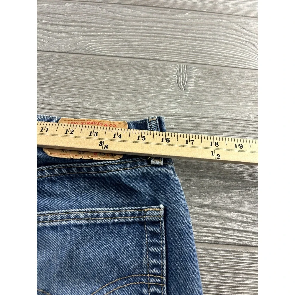 LEVI'S STRAUSS & CO Men's 521 02 Straight Regular Jeans Size W33 L34